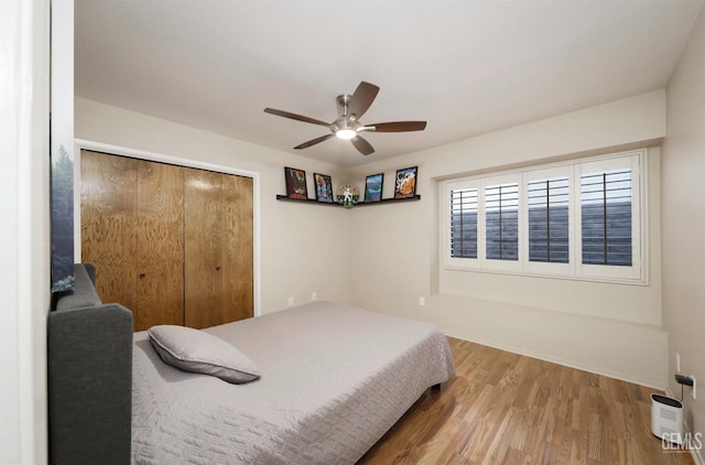 7305 Wilford Ct, Bakersfield, CA 93309 - bedroom with wood finished floors, a closet, a ceiling fan, and baseboards