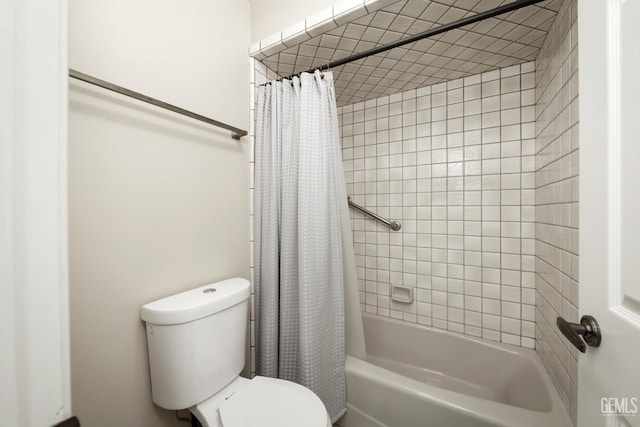 7305 Wilford Ct, Bakersfield, CA 93309 - full bath featuring toilet and shower / bath combo with shower curtain