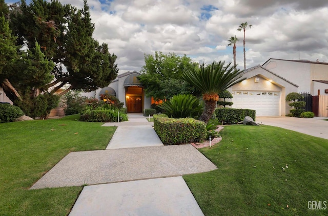 7305 Wilford Ct, Bakersfield, CA 93309 - view of front facade with concrete driveway and a garage