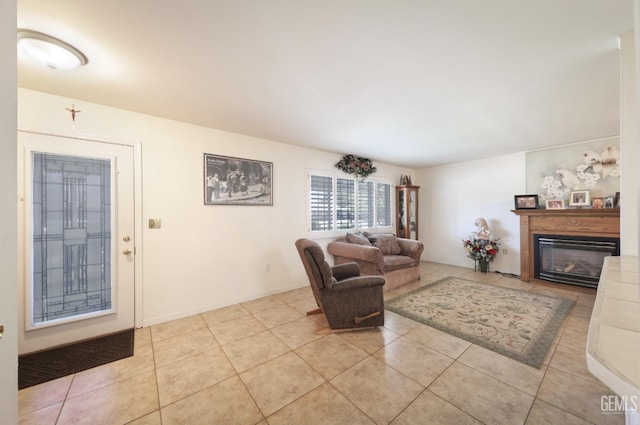 712 River Oaks Dr, Bakersfield, CA 93309 - living area featuring light tile patterned floors and a glass covered fireplace