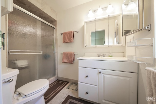 712 River Oaks Dr, Bakersfield, CA 93309 - bathroom with vanity, a shower stall, and tile patterned flooring