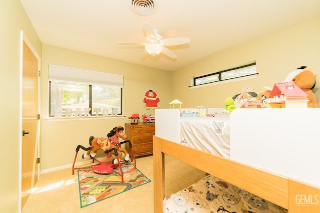 bedroom featuring carpet, visible vents, baseboards, and multiple windows