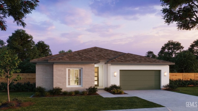 ranch-style house with a shingled roof, a front lawn, fence, a garage, and driveway