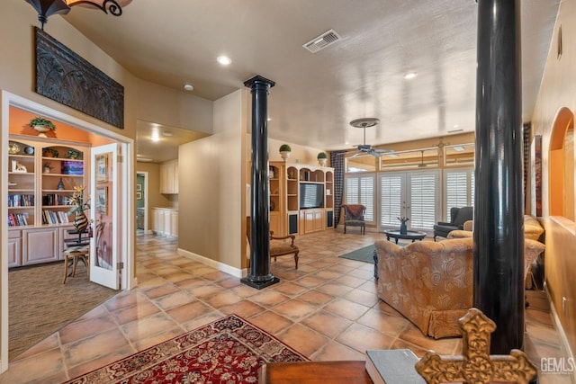 4906 Palisades Cir, Bakersfield, CA 93308 - living area featuring baseboards, recessed lighting, a ceiling fan, visible vents, and decorative columns