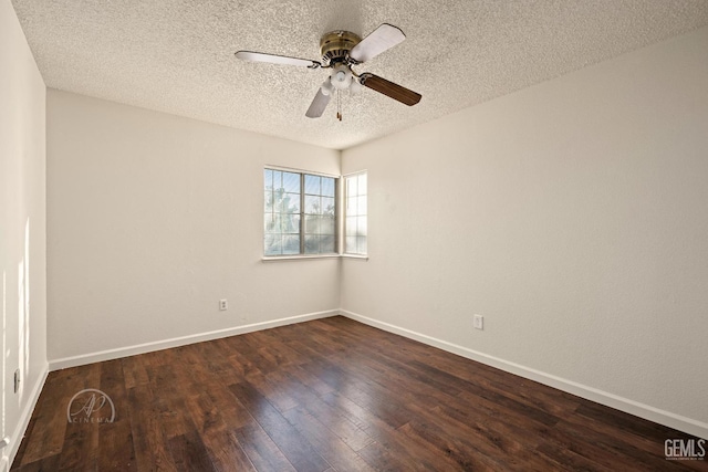 unfurnished room with ceiling fan, dark hardwood / wood-style floors, and a textured ceiling