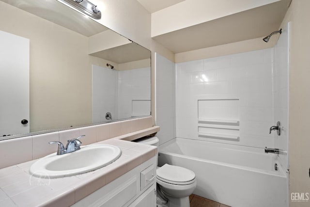 full bathroom with vanity, bathtub / shower combination, tile patterned floors, and toilet