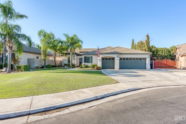 single story home featuring a garage and a front lawn