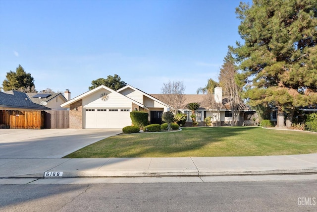 ranch-style home with a garage and a front lawn