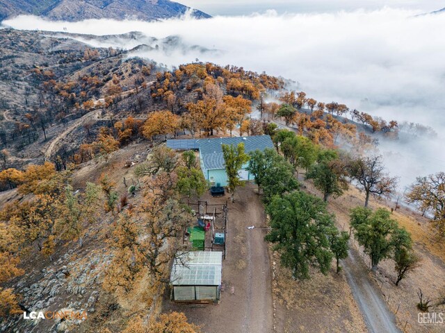 bird's eye view with a mountain view