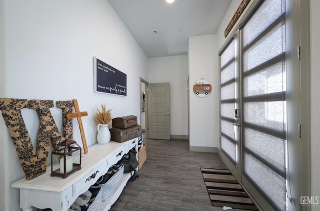 9108 Manor Forest Ln, Shafter, CA 93263 - hallway with dark wood finished floors and baseboards