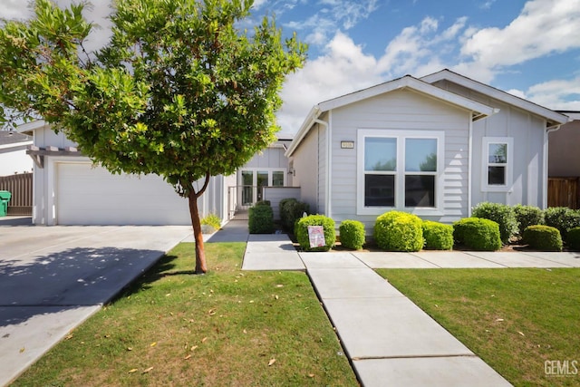 9108 Manor Forest Ln, Shafter, CA 93263 - view of front facade featuring board and batten siding and a garage