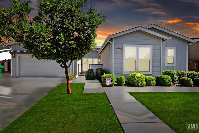 9108 Manor Forest Ln, Shafter, CA 93263 - view of front of house with board and batten siding, a garage, and concrete driveway