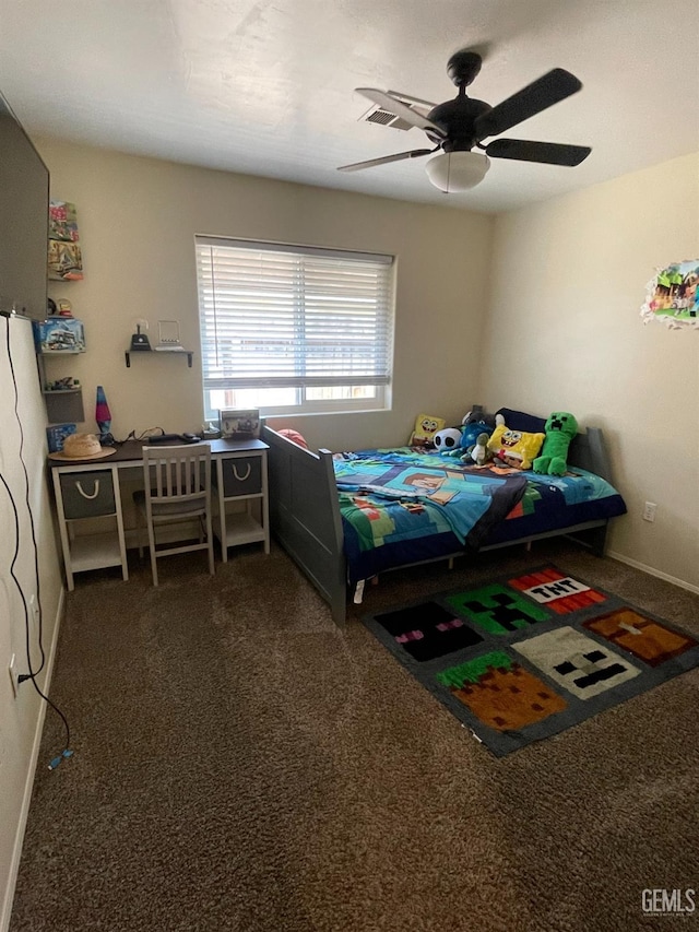 bedroom featuring ceiling fan and dark colored carpet