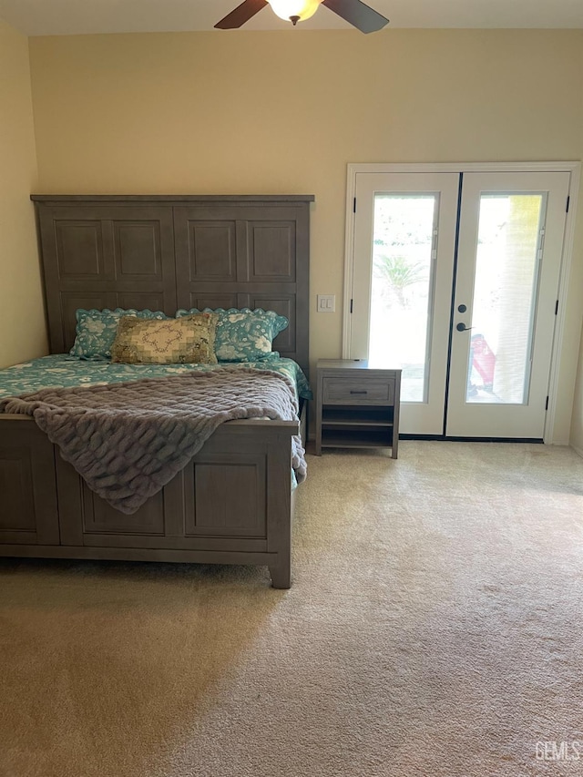 carpeted bedroom featuring french doors, ceiling fan, and access to outside