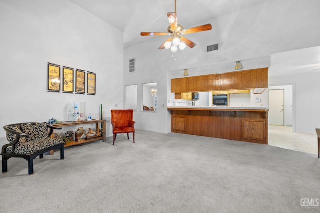14013 Laverton Ave, Bakersfield, CA 93314 - sitting room with light colored carpet, a high ceiling, and ceiling fan
