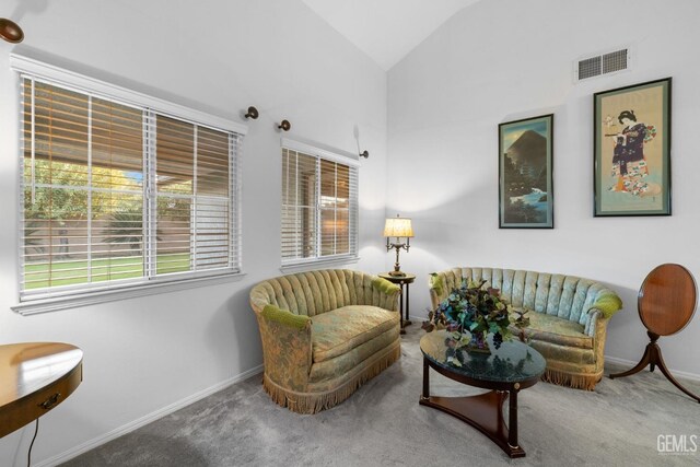 14013 Laverton Ave, Bakersfield, CA 93314 - carpeted living room with lofted ceiling and baseboards