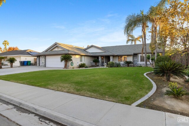 14013 Laverton Ave, Bakersfield, CA 93314 - ranch-style home with an attached garage, stone siding, concrete driveway, a porch, and stucco siding