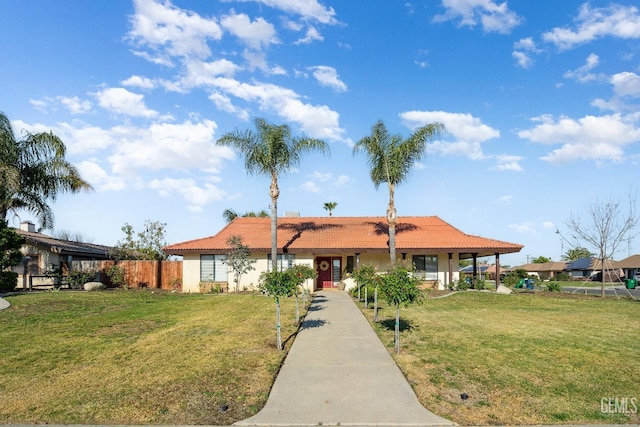 single story home with a front yard