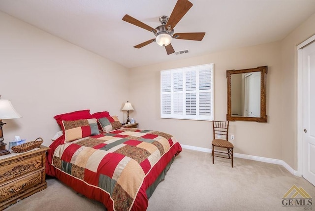 carpeted bedroom with ceiling fan