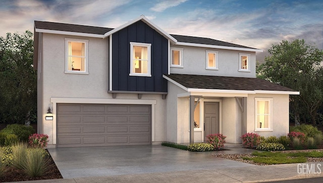 view of front of property featuring a garage