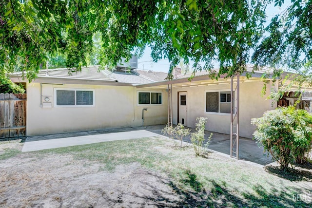 3504 Planz Rd, Bakersfield, CA 93309 - single story home featuring stucco siding and a patio area