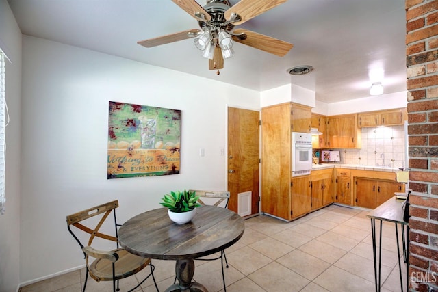 3504 Planz Rd, Bakersfield, CA 93309 - dining room with light tile patterned flooring and ceiling fan