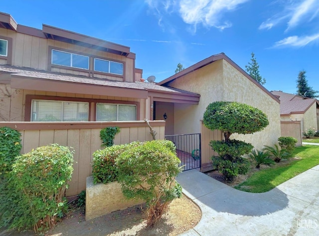 view of front of home with fence