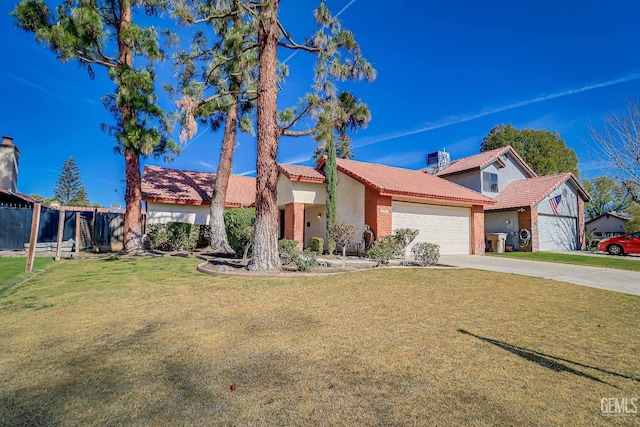 view of front of property featuring stucco siding, concrete driveway, a garage, a tiled roof, and a front lawn