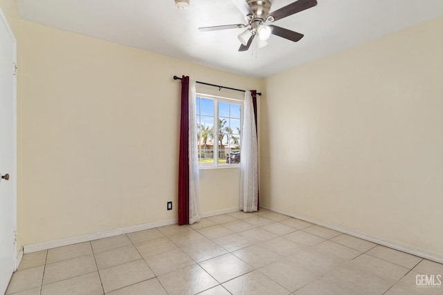 10801 Santa Clara St, Lamont, CA 93241 - unfurnished room with ceiling fan, light tile patterned flooring, and baseboards