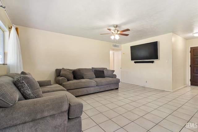 10801 Santa Clara St, Lamont, CA 93241 - living area featuring ceiling fan, baseboards, and light tile patterned floors
