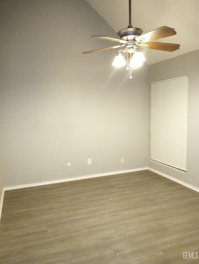 empty room with dark wood-type flooring and ceiling fan