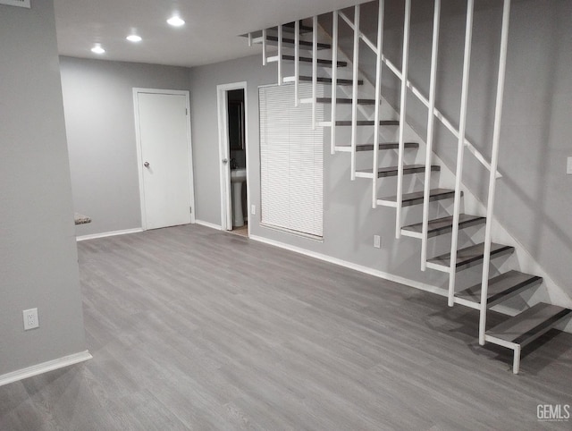 basement with wood-type flooring