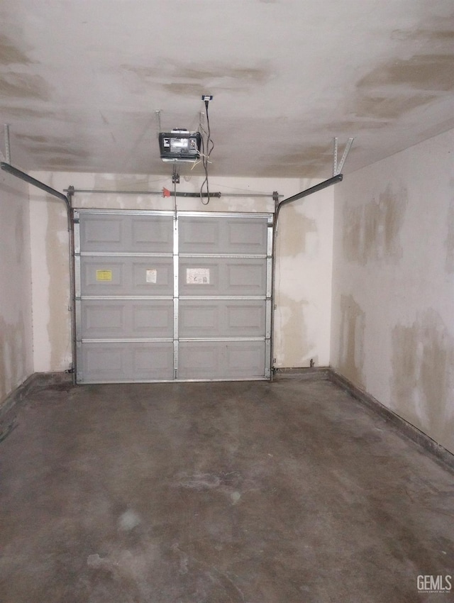 garage featuring a garage door opener