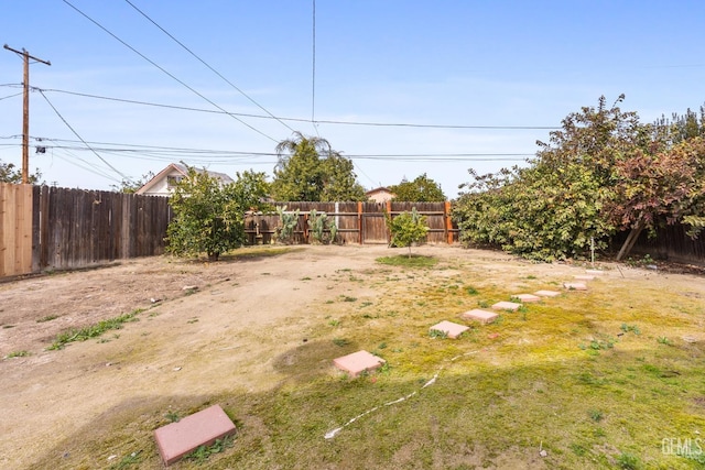 view of yard featuring fence private yard