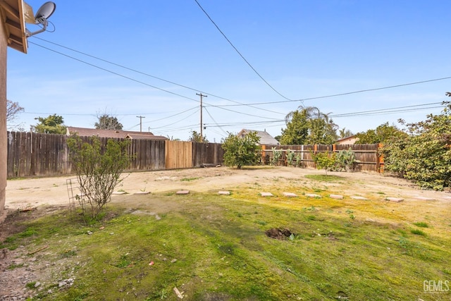 view of yard featuring a fenced backyard