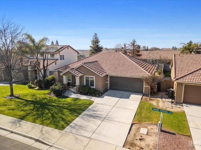 view of front facade with a garage and a front yard