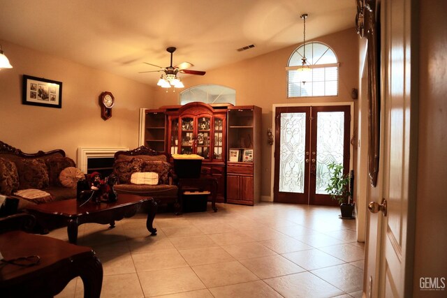 mediterranean / spanish-style home featuring a garage and a front lawn