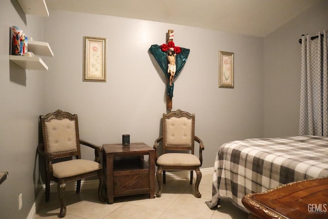 bedroom with light tile patterned flooring