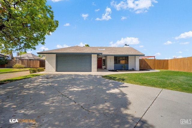 ranch-style house with fence, driveway, an attached garage, a front lawn, and brick siding