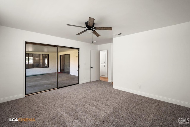 unfurnished bedroom featuring visible vents, baseboards, ceiling fan, and carpet flooring