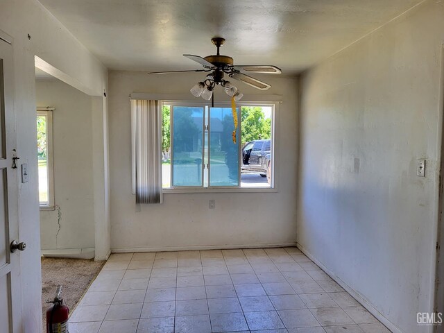 2132 Wingland Dr, Bakersfield, CA 93308 - spare room featuring ceiling fan and light tile patterned floors