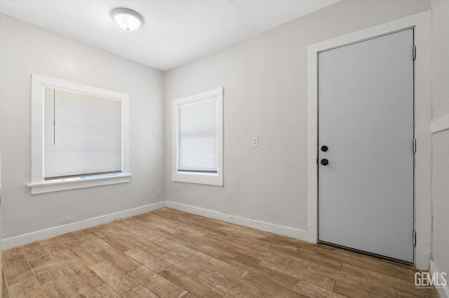 714 R St, Bakersfield, CA 93304 - empty room featuring wood finished floors and baseboards