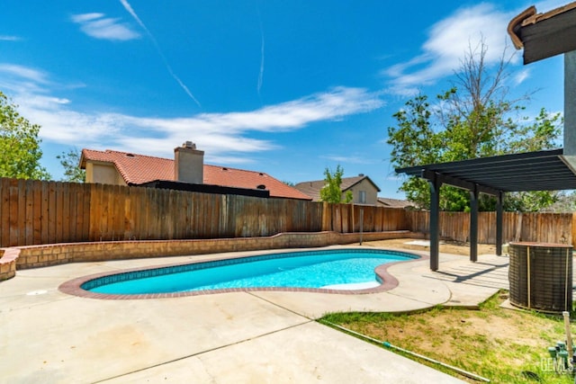 view of swimming pool featuring a patio, central AC, a fenced in pool, and a fenced backyard