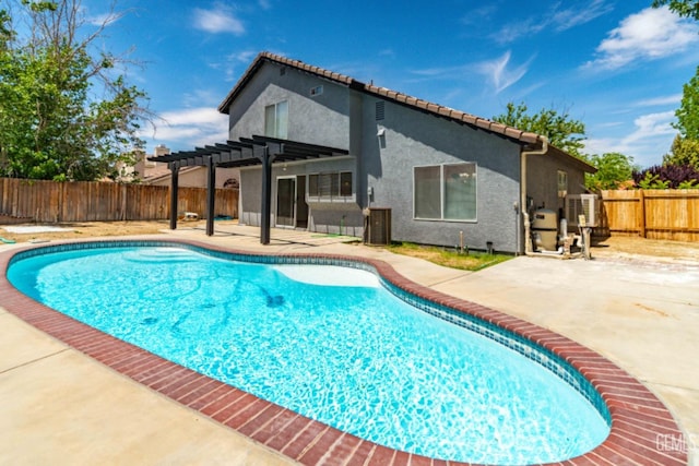 view of swimming pool with a fenced backyard, a fenced in pool, a pergola, and a patio area