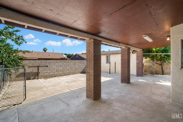 764 E Sutter Ave, Earlimart, CA 93219 - fenced backyard with a patio area