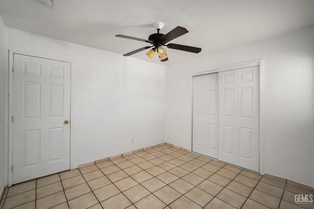 764 E Sutter Ave, Earlimart, CA 93219 - unfurnished bedroom featuring a closet and a ceiling fan