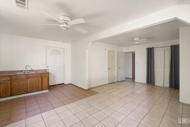 764 E Sutter Ave, Earlimart, CA 93219 - spare room featuring ceiling fan and light tile patterned floors