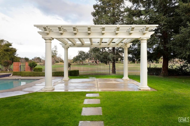 view of home's community with a patio area, a lawn, fence, and a pergola