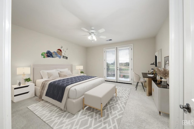 bedroom with access to exterior, visible vents, carpet floors, and a ceiling fan