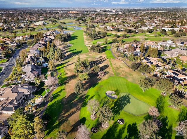 aerial view featuring golf course view and a residential view